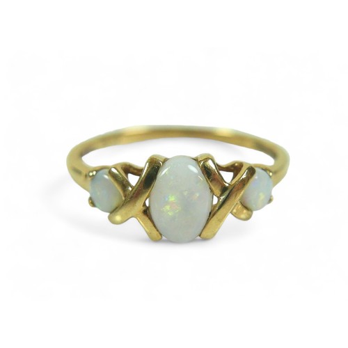 139 - A group of three dress rings, comprising a three stone opal ring, largest stone 12.02 by 10.16mm, wi... 