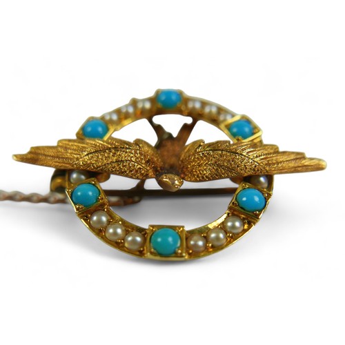 146 - An Edwardian 15ct yellow gold, turquoise and pearl set brooch, formed as a swallow surrounded by a c... 