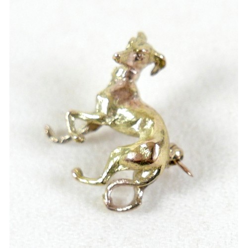 168 - A 9ct yellow gold brooch, in the form of an Italian greyhound, PJCLd, London 1992, 22 by 22mm, 6.9g.