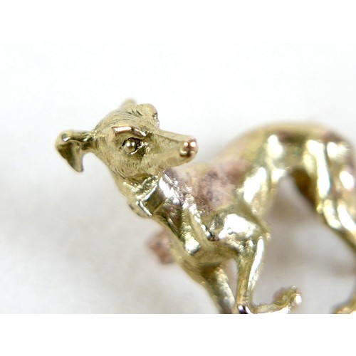 168 - A 9ct yellow gold brooch, in the form of an Italian greyhound, PJCLd, London 1992, 22 by 22mm, 6.9g.