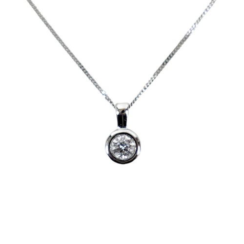 193 - A 14K white gold and solitaire diamond pendant necklace, by Orovi, Italy, approximately 0.25ct, on a... 