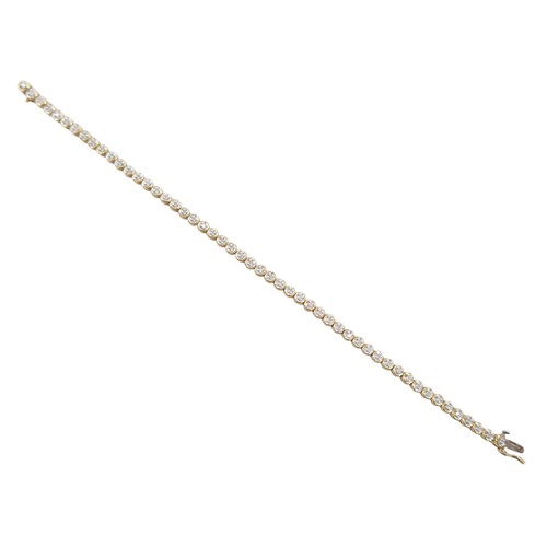 178 - A 9ct gold and diamond tennis bracelet, each round cut stone approximately 1.5mm diameter, 5.7g, 18.... 