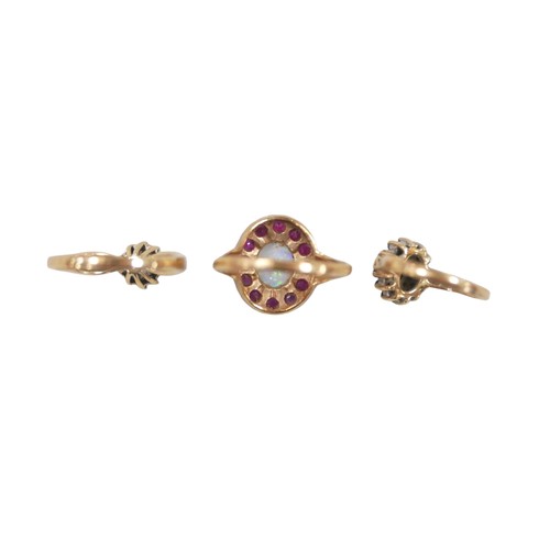 162 - Three 9ct gold dress rings, comprising an opal and ruby daisy ring, the central oval opal 8 by 6mm, ... 