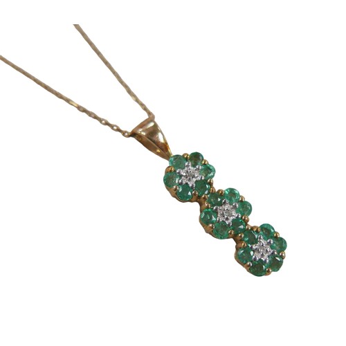 196 - A group of 9ct gold jewellery, including a diamond and emerald pendant necklace, the three small dia... 