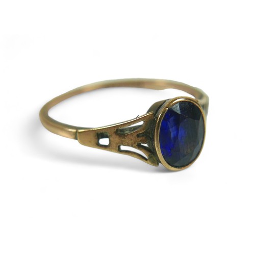 124 - Two 9ct gold ladies dress rings, comprising an Art & Craft style sapphire ring, the stone approximat... 