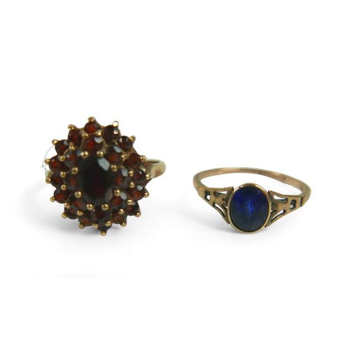 124 - Two 9ct gold ladies dress rings, comprising an Art & Craft style sapphire ring, the stone approximat... 