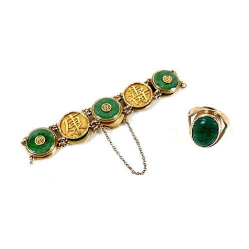 204 - A Chinese 18ct yellow gold and jade set bracelet, formed of circular panels decorated with Chinese c... 