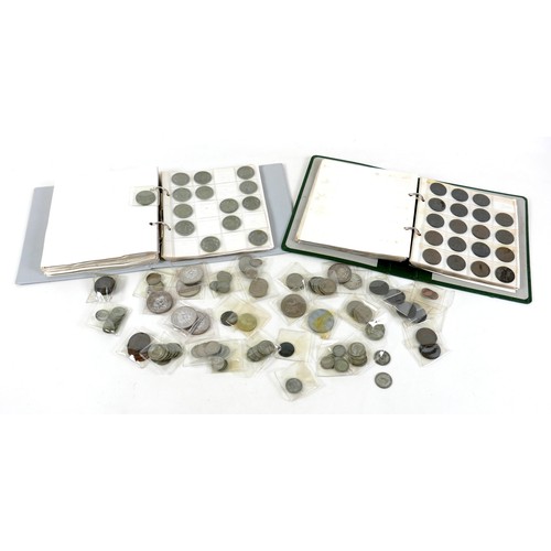 82 - A collection of mainly English coins including some silver coins, in two albums and loose.