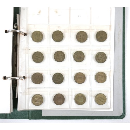 82 - A collection of mainly English coins including some silver coins, in two albums and loose.