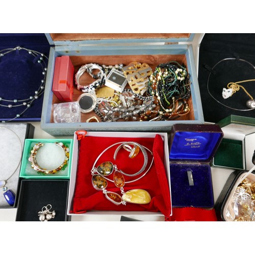 122 - A collection of costume jewellery, to include Swarovski necklaces, a Bering stainless steel wristwat... 