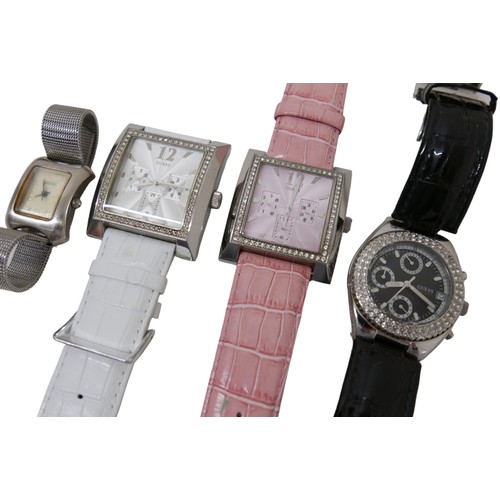 99 - A large collection of modern watches, some in their original boxes, and include Guess and Sekona. (1... 