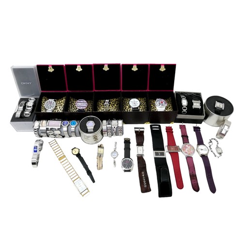 100 - A large collection of modern watches, some in their original boxes, including DKNY, Storm, and Paul'... 