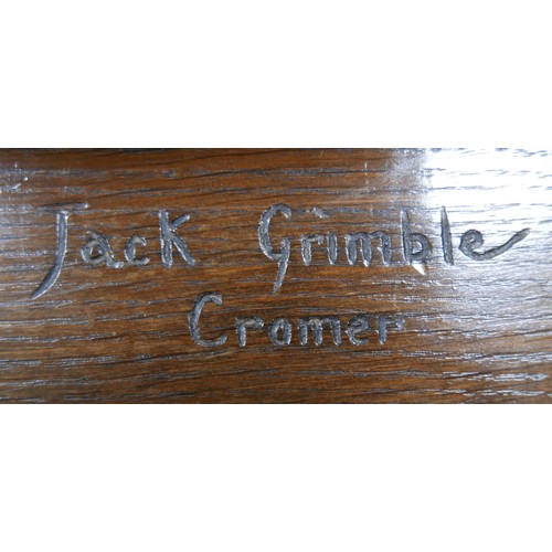 556 - A Jack Grimble of Cromer oak table, with maker's stamp, 79 by 34.5 by 31cm high.