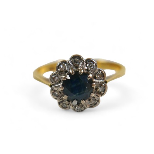 58 - An 18ct yellow gold sapphire and diamond ring, size O, 2.8 g, head size 10 by 5mm.