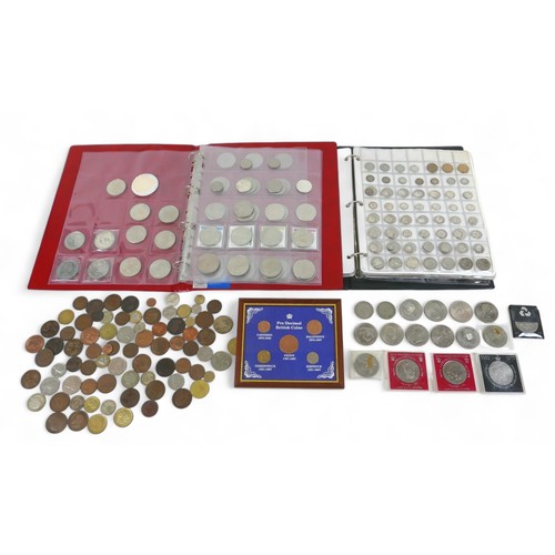 122 - A collection of Georgian and later coins in two albums and loose, including 47 old £2 coins.