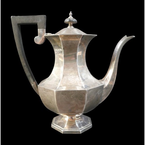 16 - A George V silver coffee pot, Walker and Hall, Sheffield 1922, 754g / 24.2toz, 24 by 13 by 23cm high... 