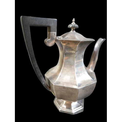 16 - A George V silver coffee pot, Walker and Hall, Sheffield 1922, 754g / 24.2toz, 24 by 13 by 23cm high... 