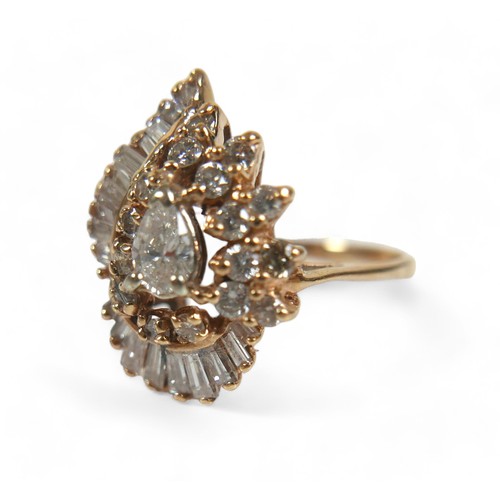 95 - A 14ct yellow gold and diamond cluster dress ring, circa 1970s, set centrally with a pear cut diamon... 