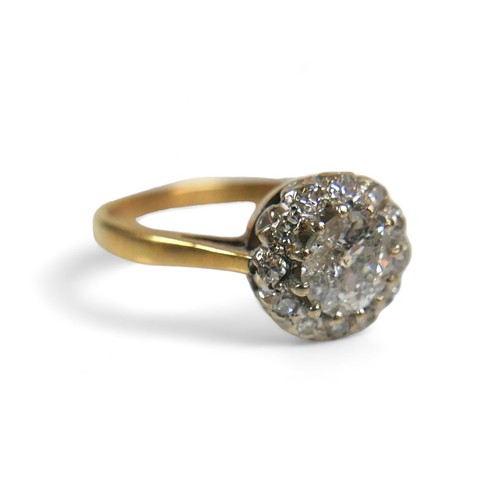 93 - An 18ct yellow gold and diamond ring, set centrally with an old cut stone, 6.1 by 3.7mm, 0.7ct, surr... 