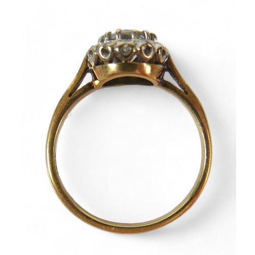 93 - An 18ct yellow gold and diamond ring, set centrally with an old cut stone, 6.1 by 3.7mm, 0.7ct, surr... 