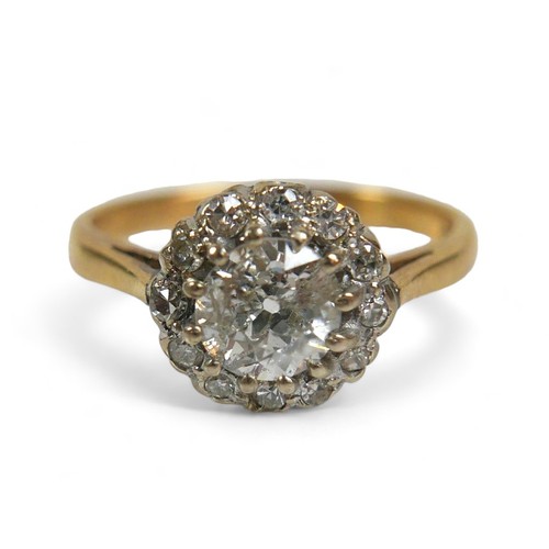 93 - An 18ct yellow gold and diamond ring, set centrally with an old cut stone, 6.1 by 3.7mm, 0.7ct, surr... 