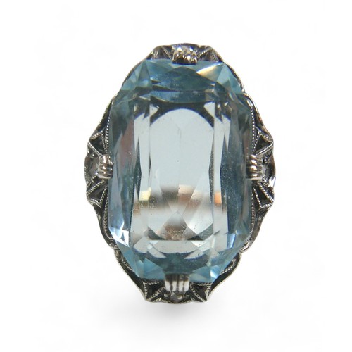 96 - An Art Deco 14ct yellow gold and platinum aquamarine and diamond ring, possibly Austrian, the octago... 