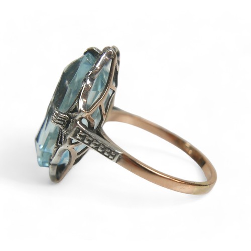 96 - An Art Deco 14ct yellow gold and platinum aquamarine and diamond ring, possibly Austrian, the octago... 