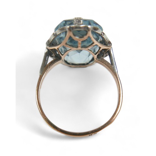 96 - An Art Deco 14ct yellow gold and platinum aquamarine and diamond ring, possibly Austrian, the octago... 