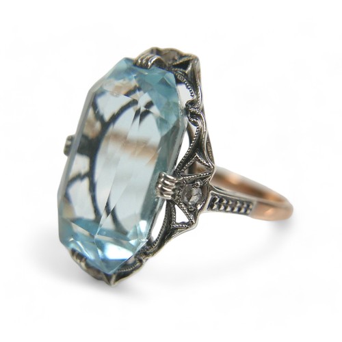 96 - An Art Deco 14ct yellow gold and platinum aquamarine and diamond ring, possibly Austrian, the octago... 