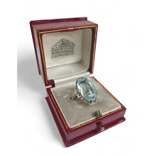 96 - An Art Deco 14ct yellow gold and platinum aquamarine and diamond ring, possibly Austrian, the octago... 