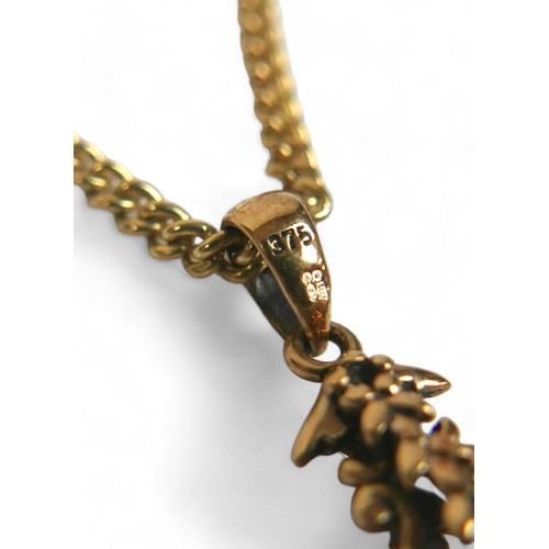 65 - A 9ct gold necklace, with gold and topaz fob, chain length 45cm, gross total weight 10.7g.