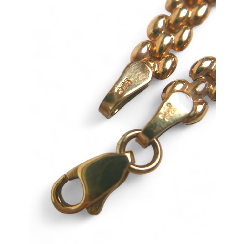 79 - A group of 9ct gold jewellery, comprising a horseshoe locket necklace, with seed pearls, chain lengt... 