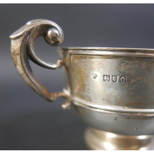 19 - A group of four silver items, comprising a sparrow beak cream jug, milk jug, sauce boat and sugar bo... 