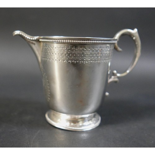 19 - A group of four silver items, comprising a sparrow beak cream jug, milk jug, sauce boat and sugar bo... 