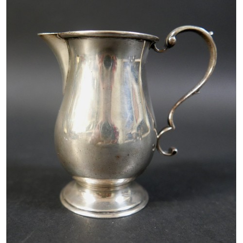 19 - A group of four silver items, comprising a sparrow beak cream jug, milk jug, sauce boat and sugar bo... 