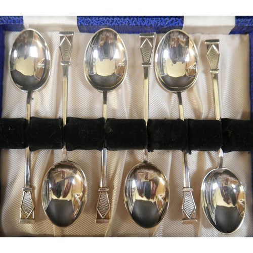 43 - A collection of assorted silver items, to include two boxed sets of coffee spoons, a cruet set, a we... 