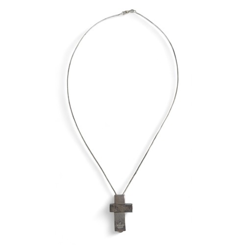 59 - A silver box link necklace suspending a Gucci silver three section asymmetrical cross shaped pendant... 