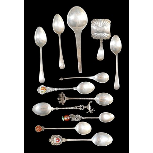 24 - A small collection of silver teaspoons, comprising two Georg Jensen Danish silver teaspoons, one pla... 