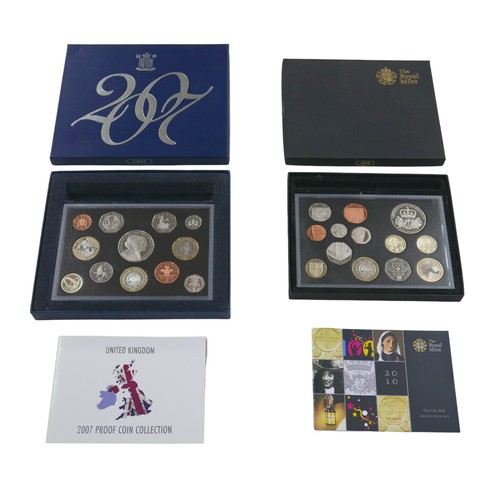 120 - Two Royal Mint British proof coin sets, comprising a 2007 set, together with a 2010 set, both with b... 