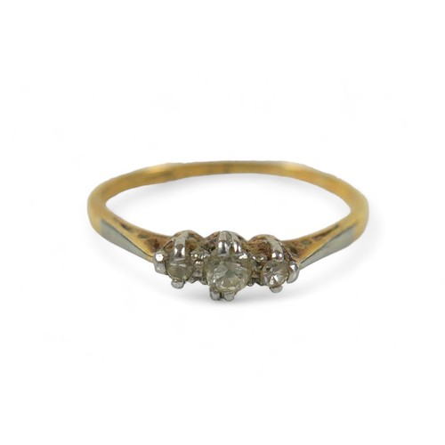 71 - An 18ct gold and diamond three stone ring, maker RK & T, size O.