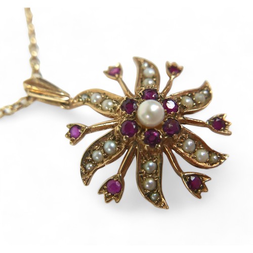 75 - Two pendant necklaces, comprising, a 9ct yellow gold chain, 4.0g, with a gold sunburst flowerhead pe... 