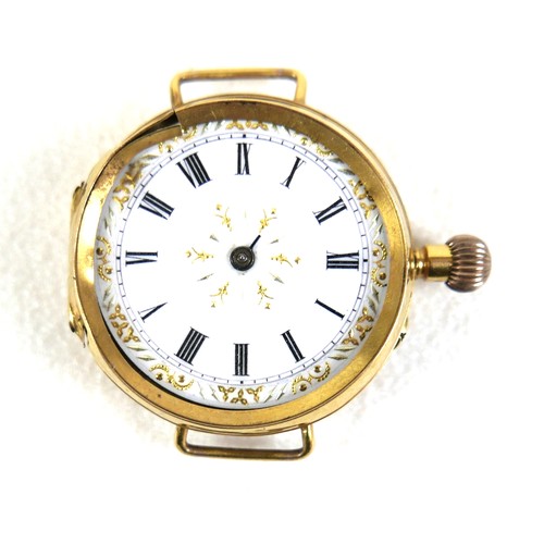 103 - A 9ct yellow gold wristwatch head, circa 1905, being a very early wristwatch with pocket watch body ... 