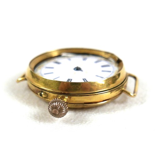 103 - A 9ct yellow gold wristwatch head, circa 1905, being a very early wristwatch with pocket watch body ... 