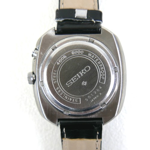 102 - A Seiko Bell-Matic 17 Jewel gents wristwatch, grey dial, baton markers, internal rotating alarm set ... 