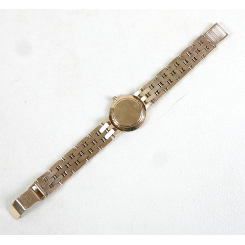 108 - A 9ct gold Rotary lady's wristwatch, the circular white dial with Roman numerals, on 9ct gold bracel... 