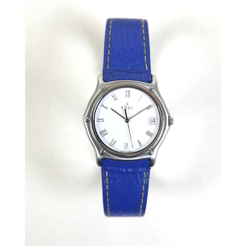 110 - An Ebel Sport Classique stainless steel quartz wristwatch, on a blue leather strap, 34mm case, with ... 