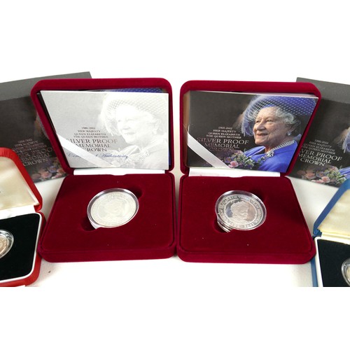 116A - A group of UK silver proof coin sets, to include 1990 silver proof 5p 2-coin set, £1 silver proof pi... 