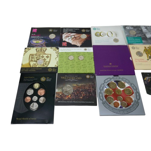 117 - A large collection of British coin sets, including Royal Mint brilliant and uncirculated coin collec... 