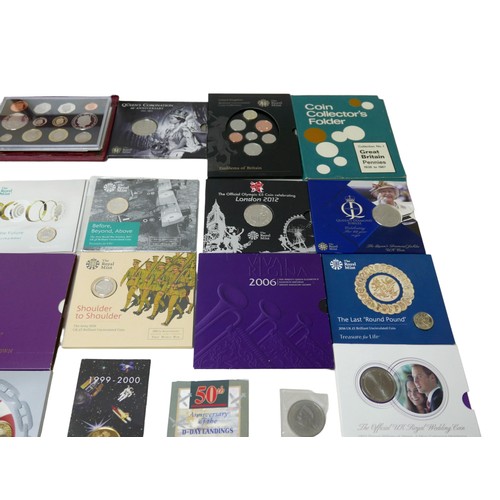 117 - A large collection of British coin sets, including Royal Mint brilliant and uncirculated coin collec... 