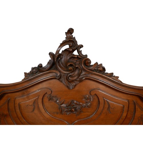 An early 1900's carved walnut headboard and footboard, headboard 154 by ...